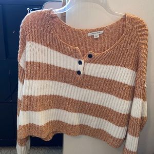 Super cute sweater with some buttons, striped